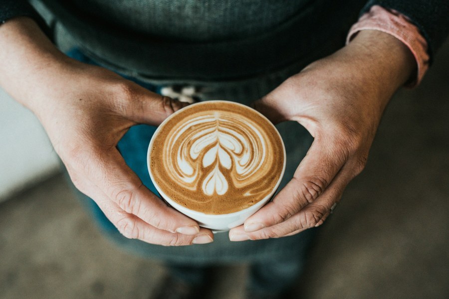 Hands Holding a Latte