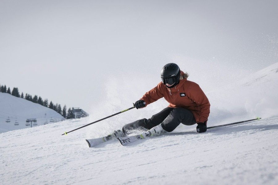 Person in a Red Jacket Skiing
